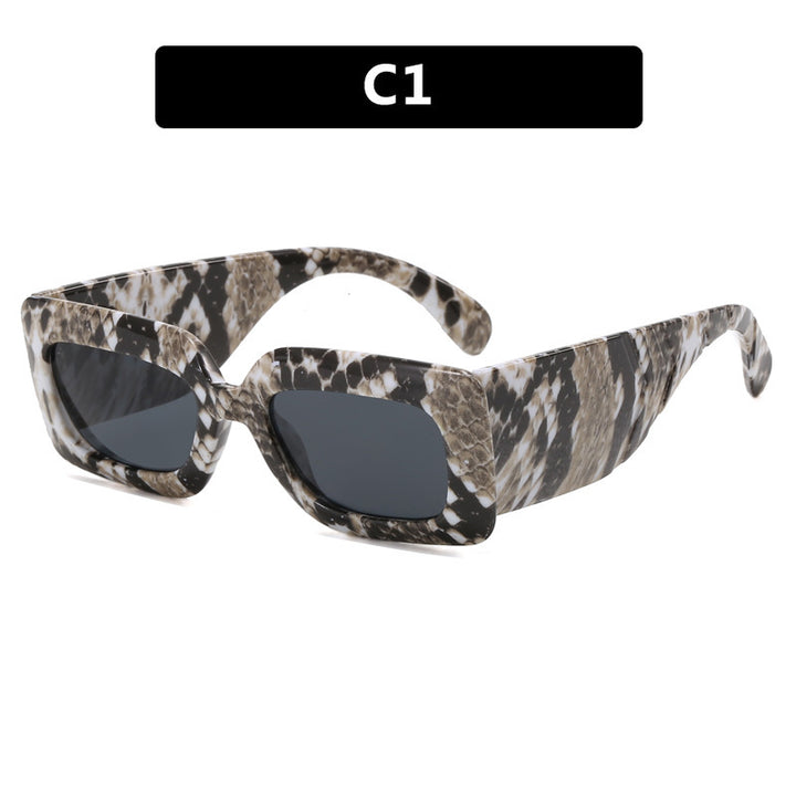 Women oversized sunglasses in fashionable snake leather look Bowlift