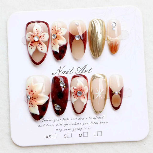 Artistic Press-On Nail Set with Floral Accents Bowlift