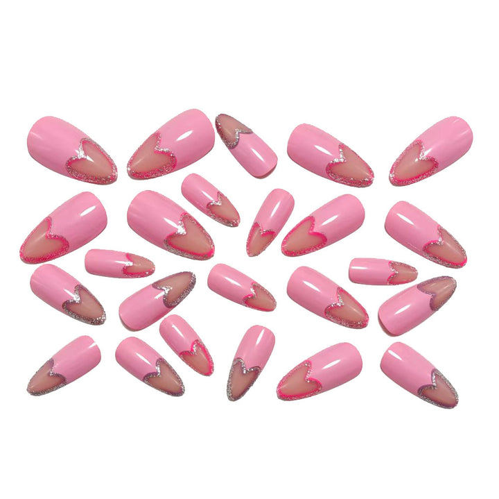 Art nails with heart design and glitter accents Bowlift
