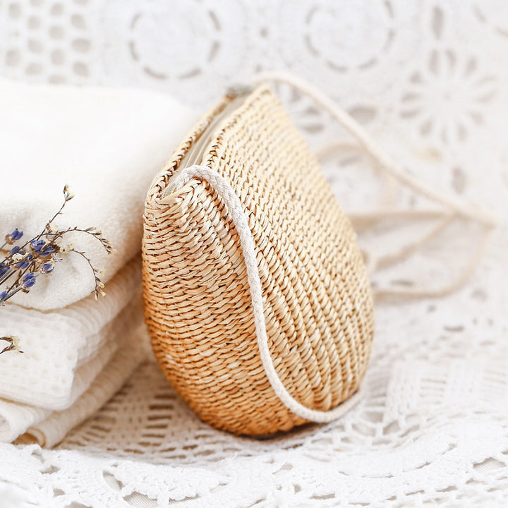 Handcrafted basket bag in unique half-moon design Bowlift