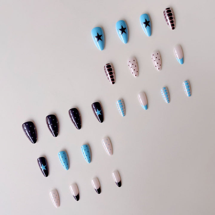 Artificial nail set with creative patterns and playful accents Bowlift