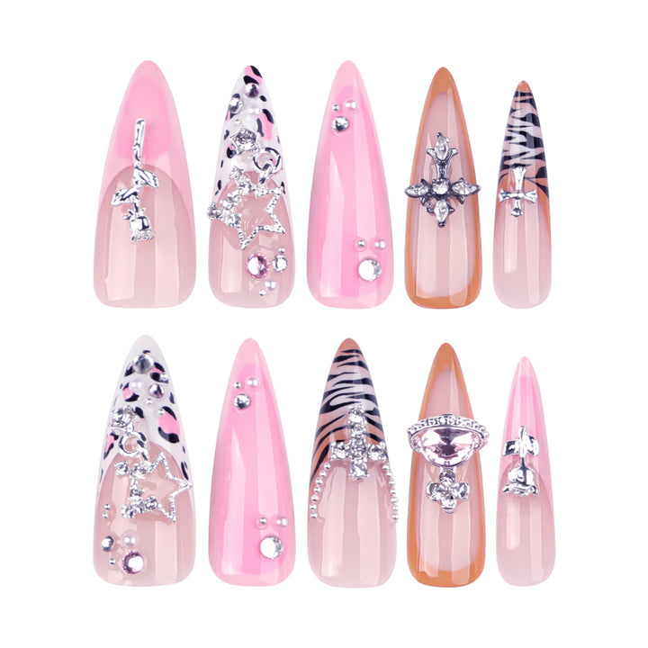 Artful stiletto nails with glitter and rhinestone embellishments Bowlift