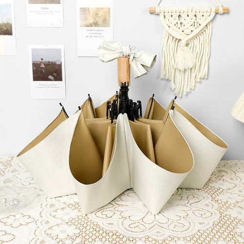 Ladies stylish handheld umbrella with decorative design Bowlift