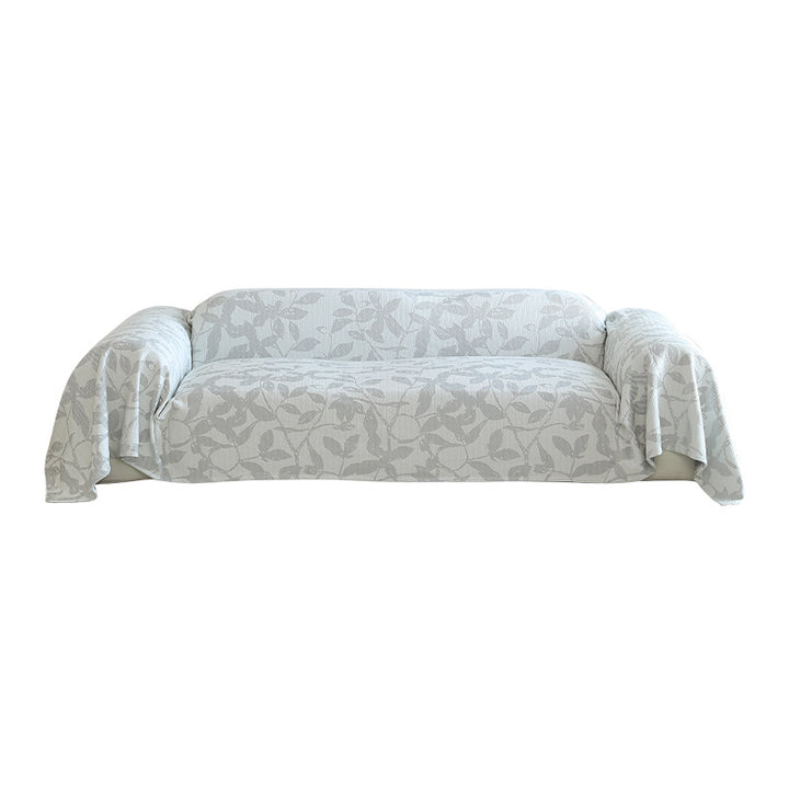 Elastic sofa cover with floral relief structure and universal fit