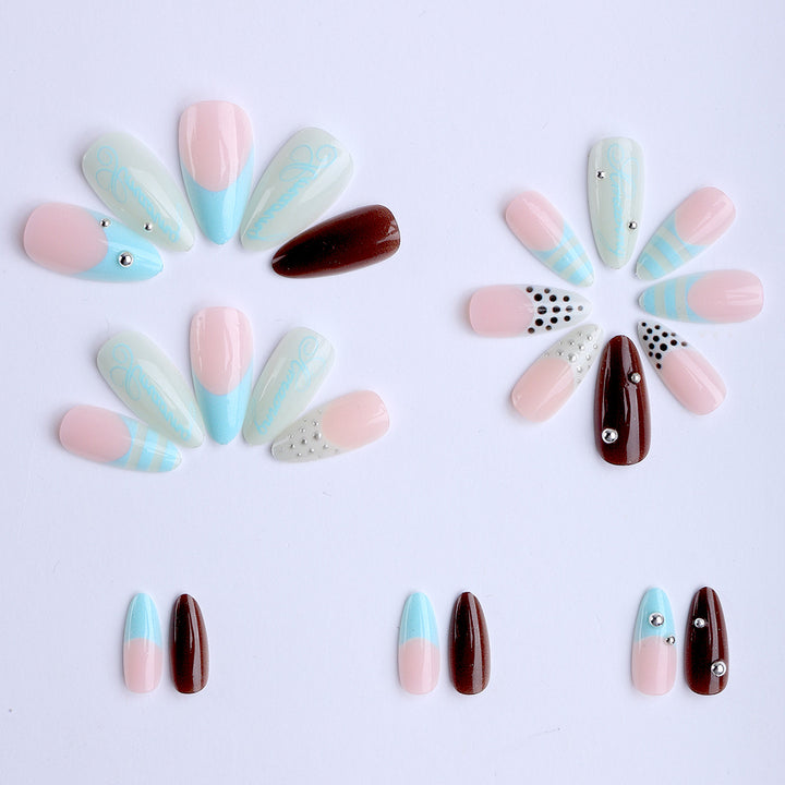 Artificial stiletto nails with glamorous applications Bowlift