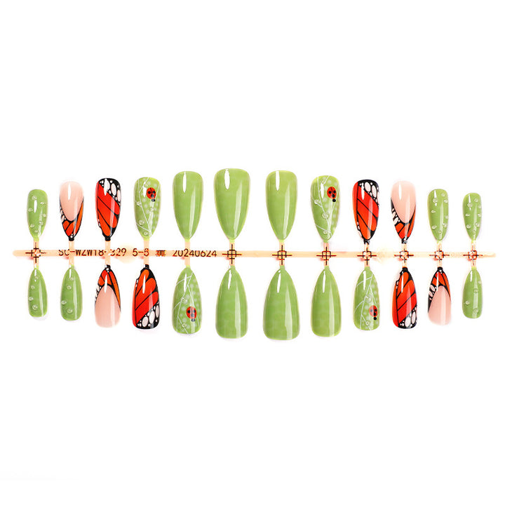 Artistic Press-On Nail Set with Butterfly and Floral Designs Bowlift