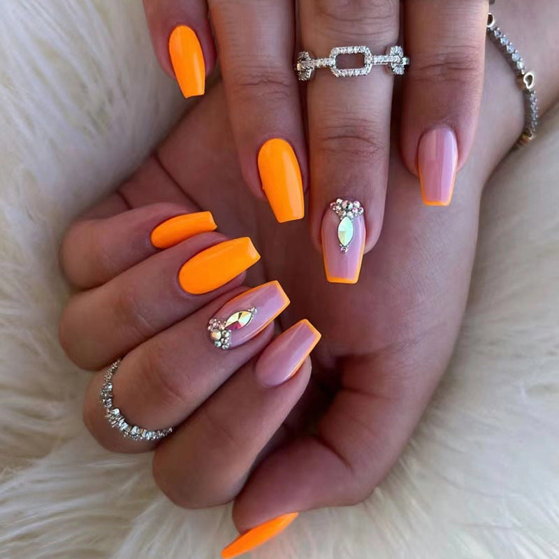 Acrylic nail set with trendy neon colors and rhinestone accents Bowlift