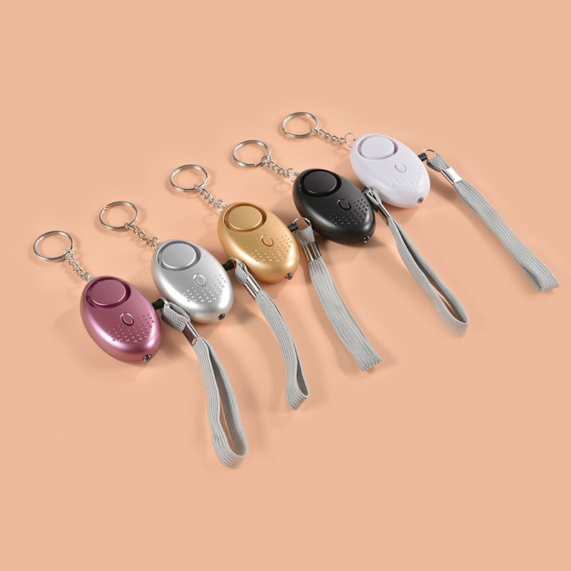 Compact personal safety alarm keychain Bowlift