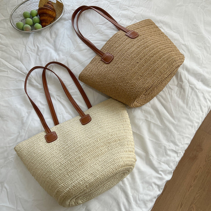 Handcrafted straw bag with elegant leather handles Bowlift
