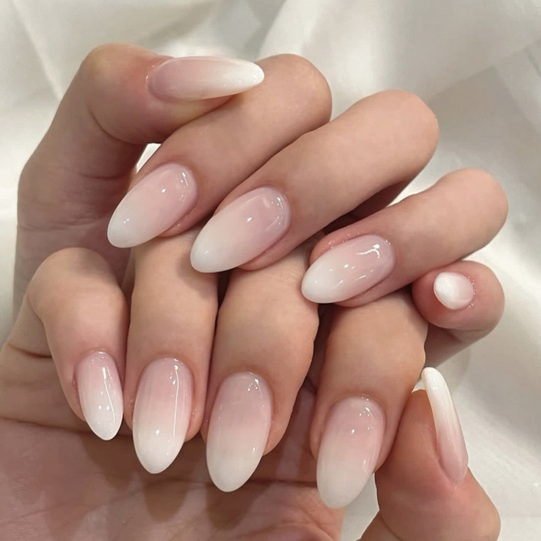 Artful stiletto nails with an elegant gradient and high gloss Bowlift
