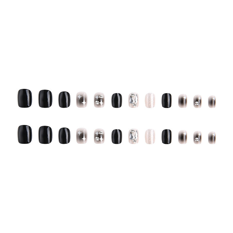 Artificial nail set with glamorous glitter and crystal decorations Bowlift