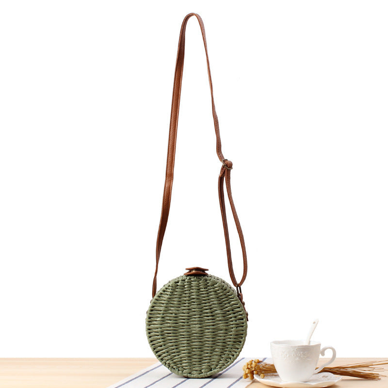 Round basket bag with leather accents Bowlift