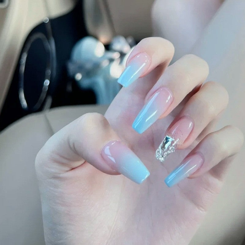 Nail set with elegant ombre and glitter accents Bowlift