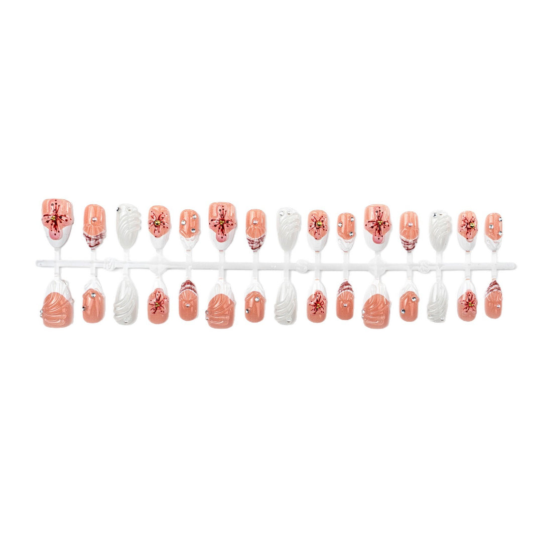Artificial nails with handcrafted flower and glitter elements Bowlift