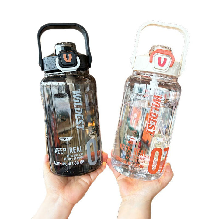 Women’s large water bottle with integrated straw and carrying handle Bowlift