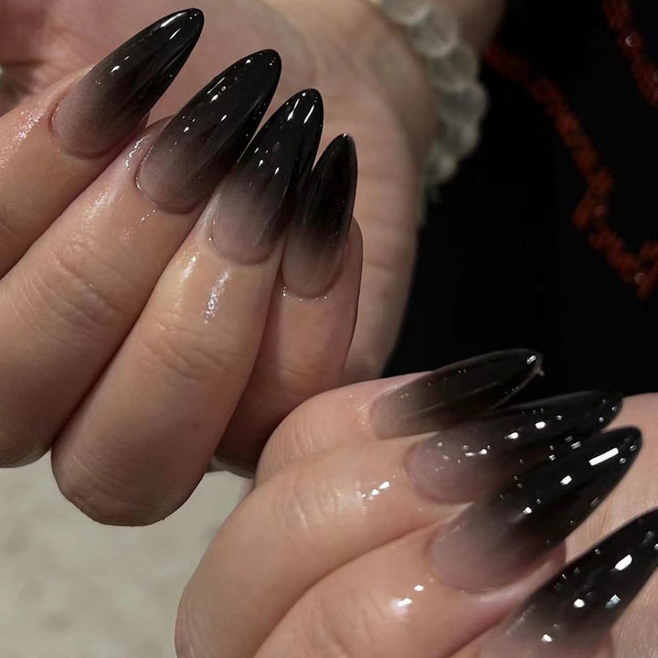 Creative Stiletto Nail Art with Blood Red Accents Bowlift