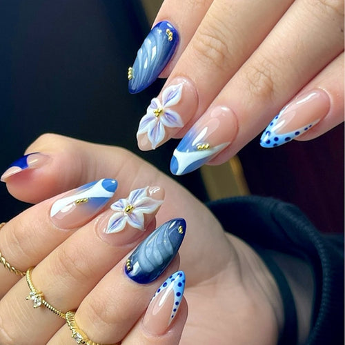 Nail set with handmade floral designs and elegant glitter Bowlift