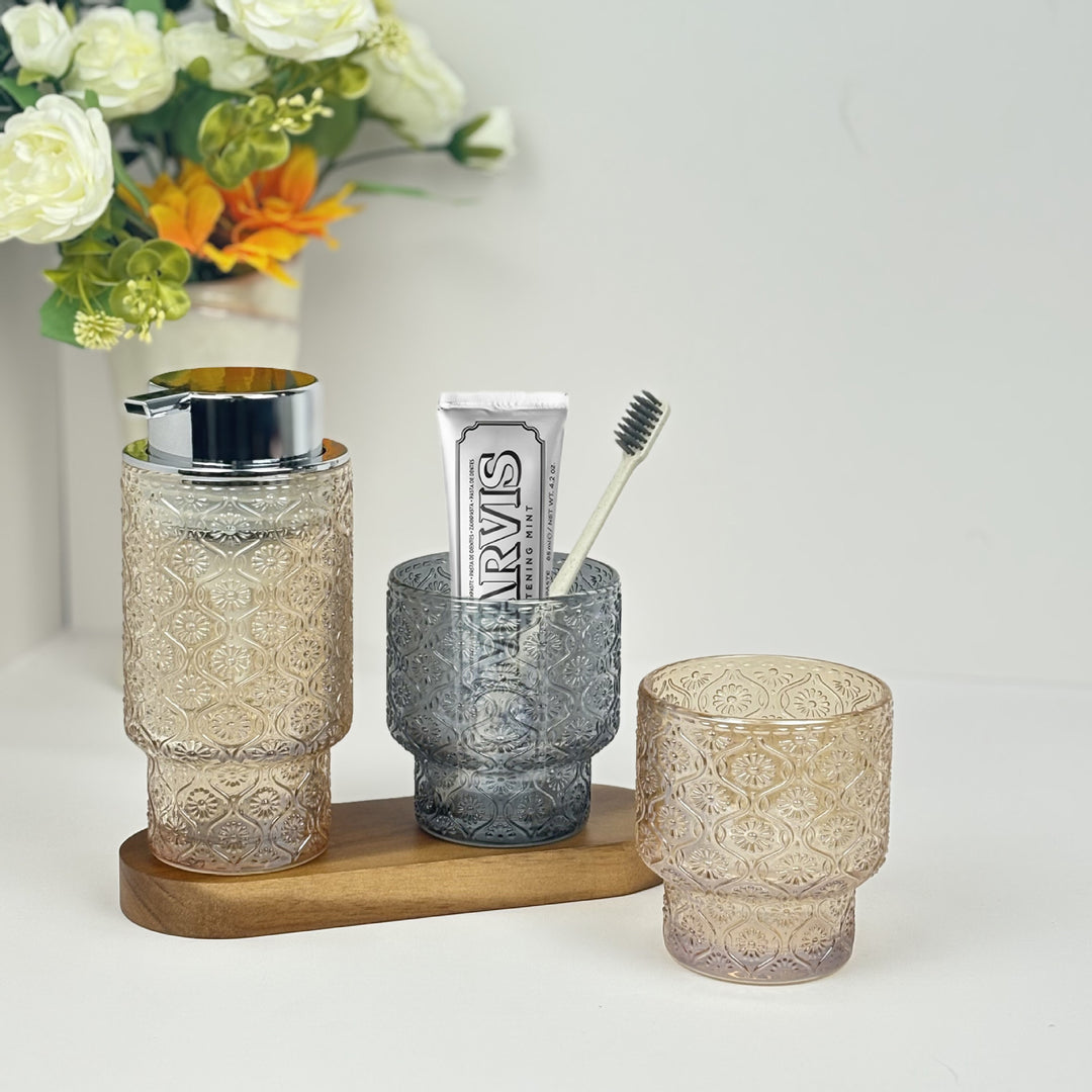 Embossed vintage glass vanity organizer set with pump dispenser and toothbrush cup Bowlift
