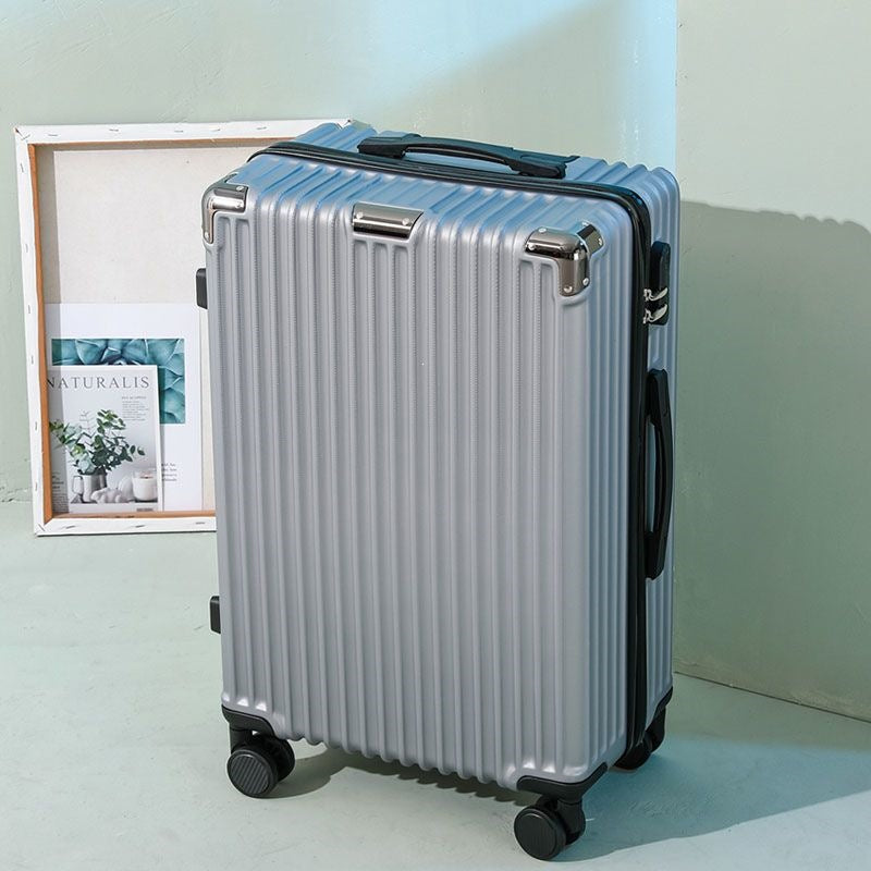 Hard shell suitcase with 360-degree wheel system and integrated safety feature Bowlift