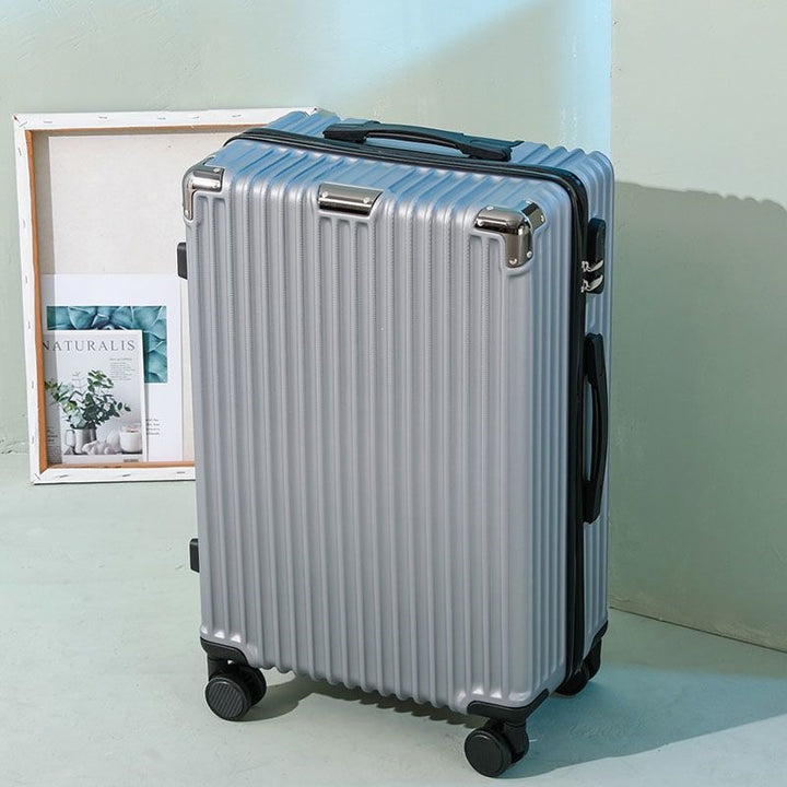 Hard shell suitcase with 360-degree wheel system and integrated safety feature Bowlift