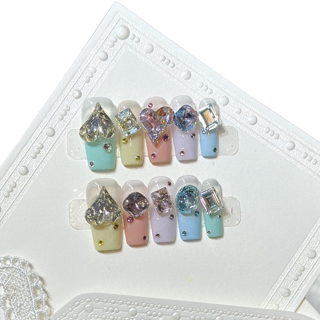 Artistic Press-On Nail Set with Gemstone Embellishments Bowlift