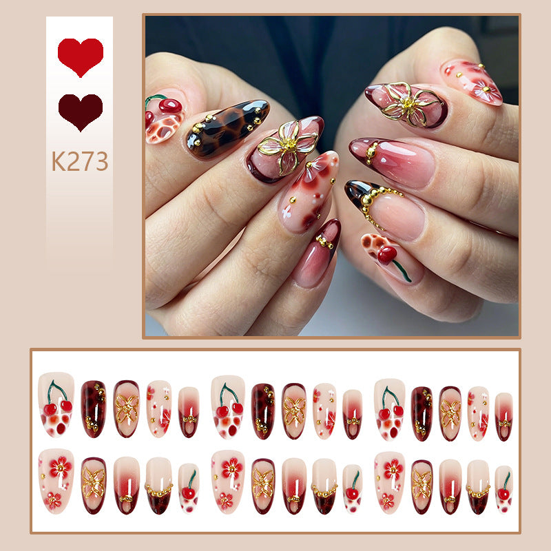 Artful nail tips with cheerful flower and cherry design Bowlift