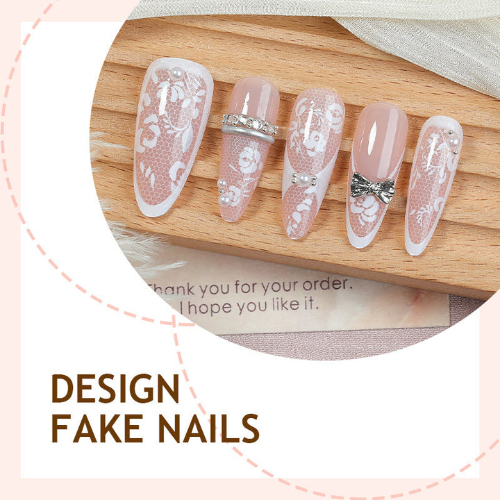 Artificial nail set with romantic floral design and sparkling accents Bowlift