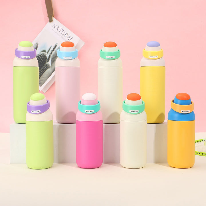 Women's insulated drinking bottle with ergonomic closure Bowlift