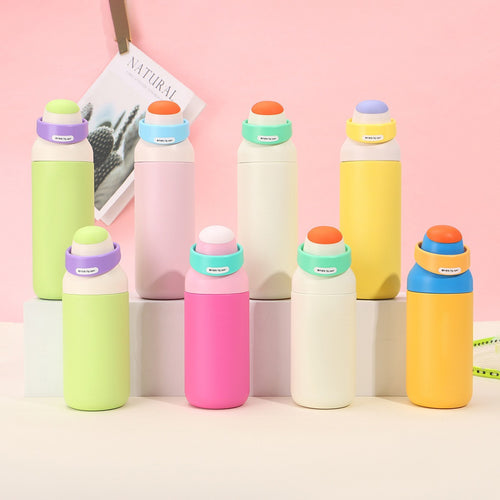 Women's insulated drinking bottle with ergonomic closure Bowlift