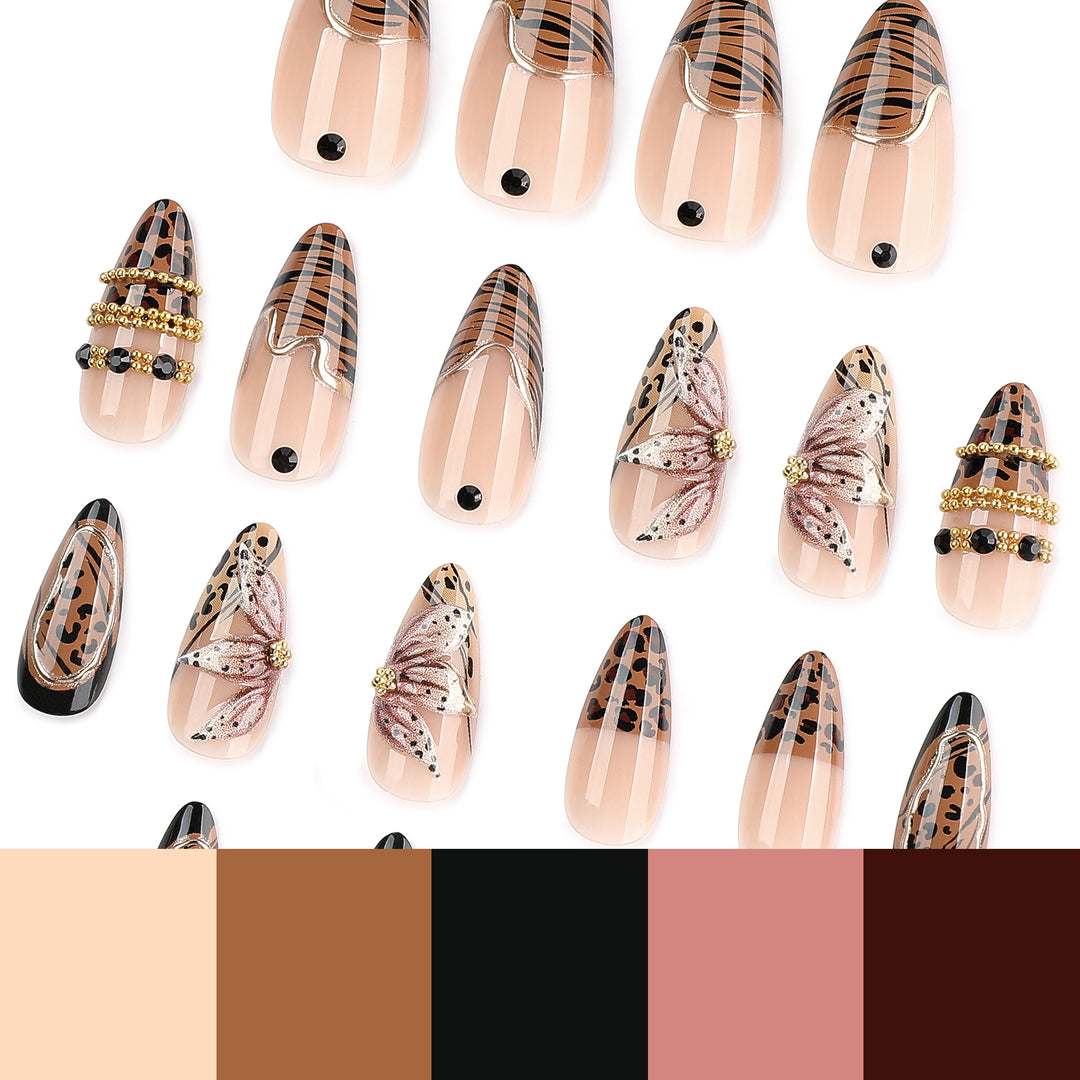 Artful stiletto nail with floral accents and gold embellishments Bowlift