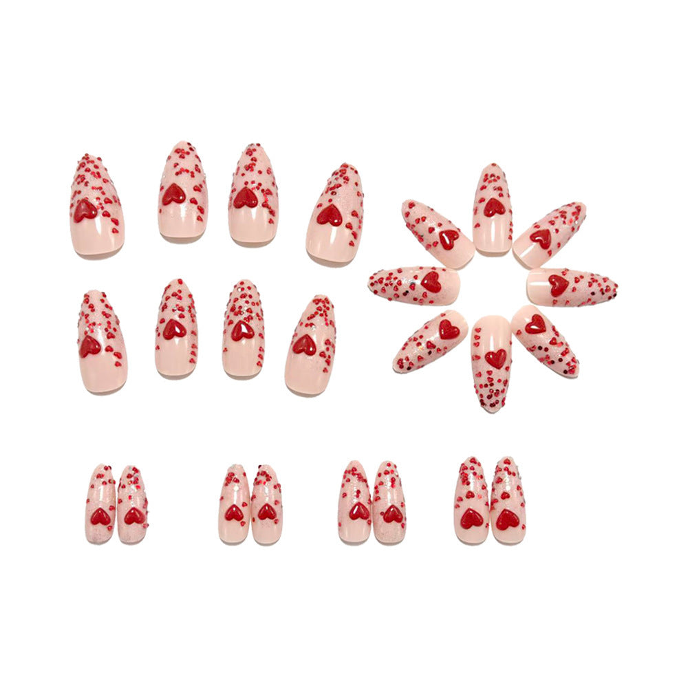 Glamorous artificial nails with heart design and glitter Bowlift