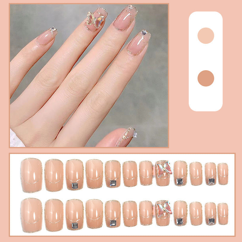Glamorous artificial nails with delicate rhinestone decorations Bowlift