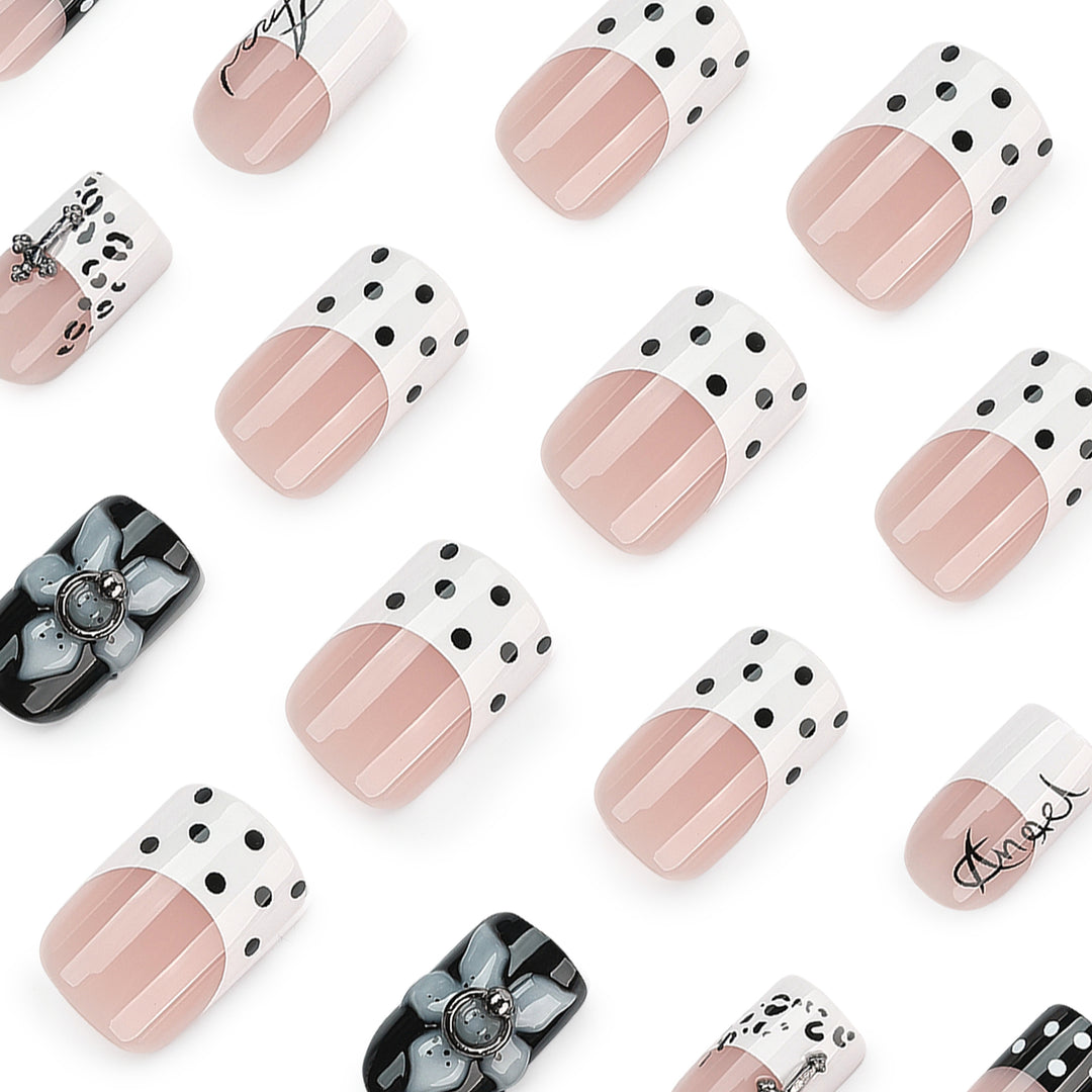 Artful nail extensions with elegant black-and-white design Bowlift