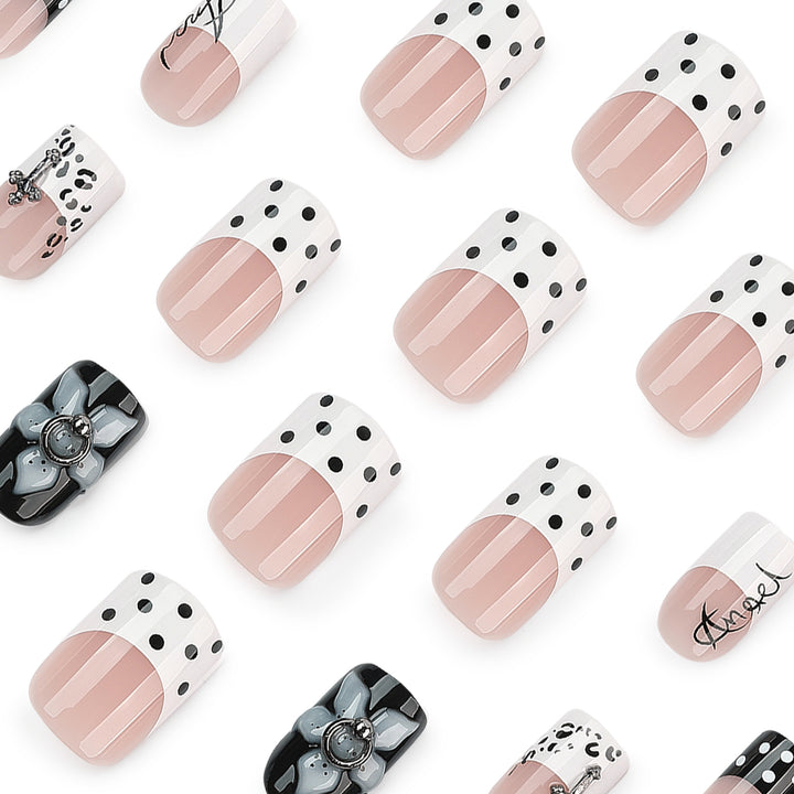 Artful nail extensions with elegant black-and-white design Bowlift
