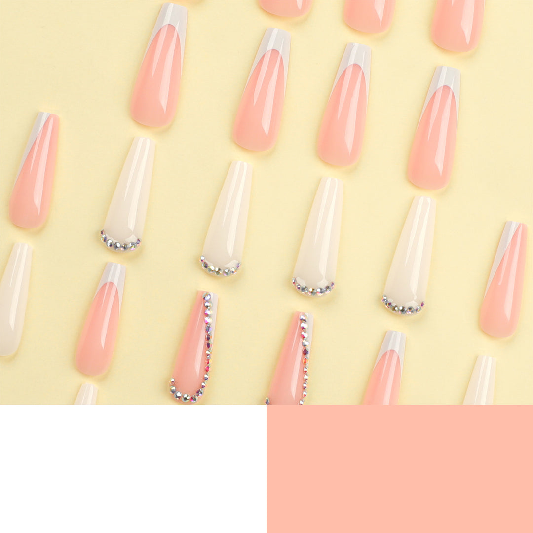 Artful nail extensions with rhinestone embellished accents Bowlift