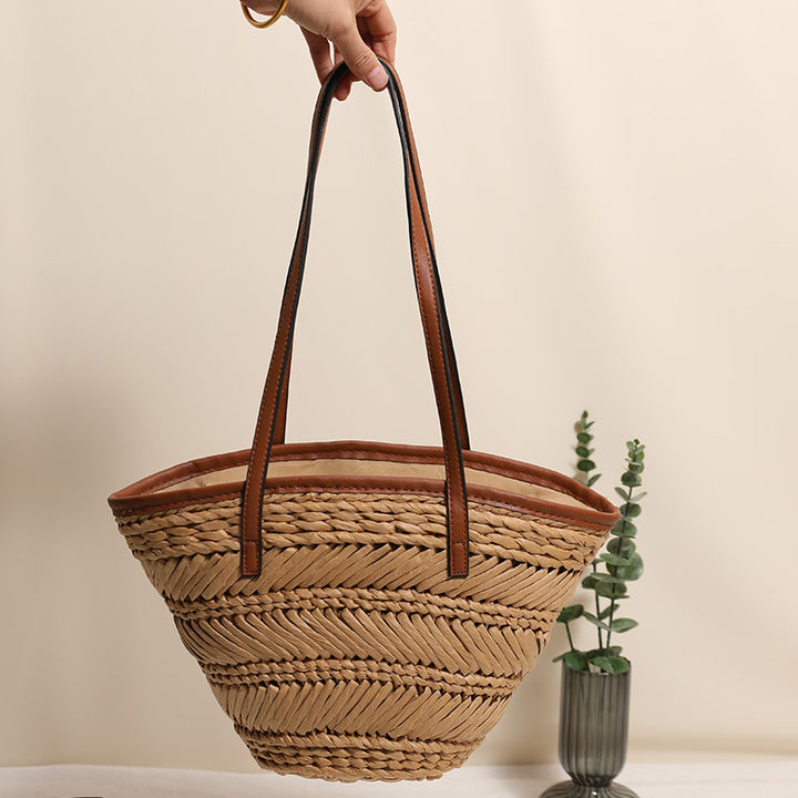 Braided basket bag with innovative leather handles Bowlift