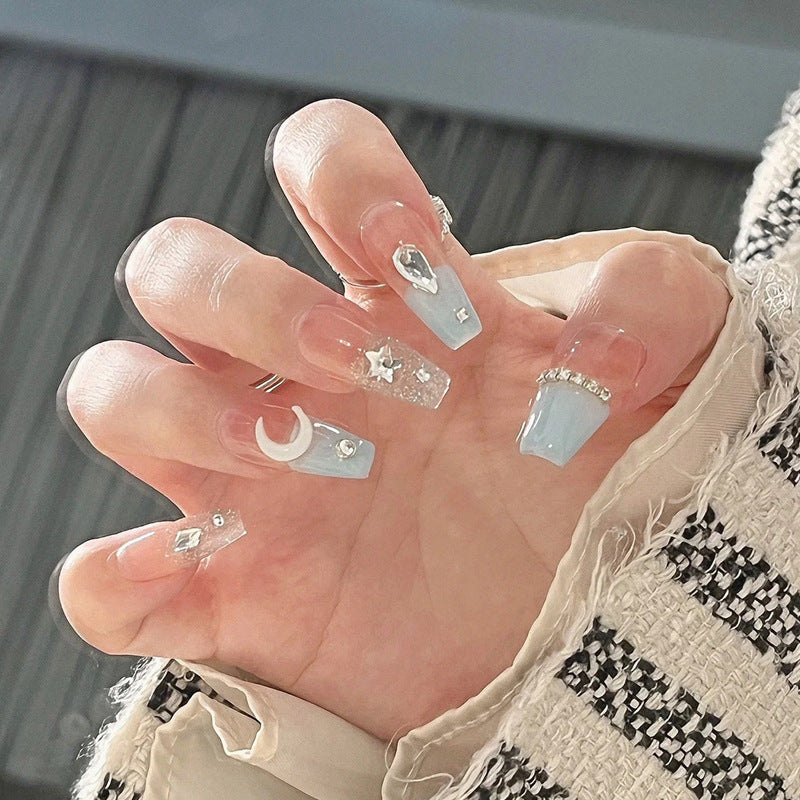 Glamorous artificial nails with delicate flower and glitter effects Bowlift