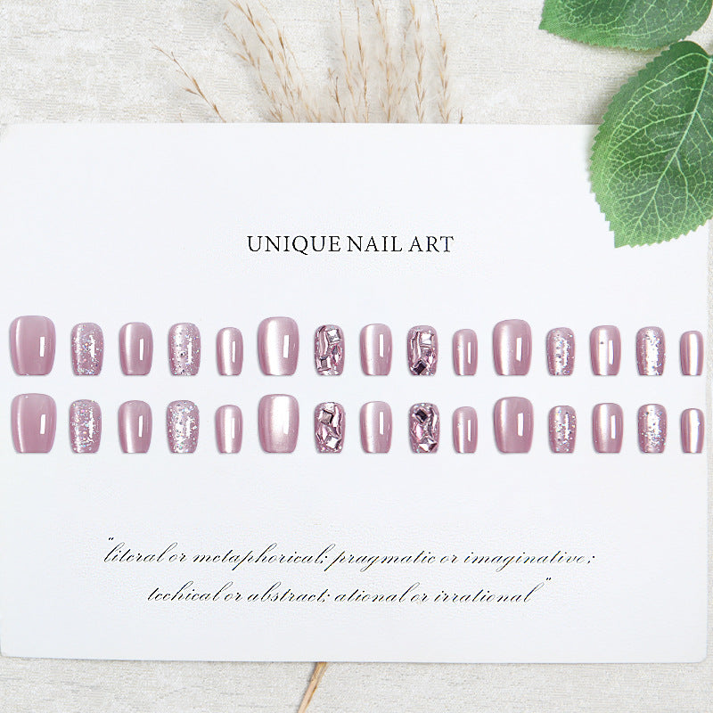 Artificial nail set with glitter and metallic effects Bowlift