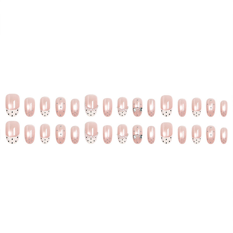 Artificial nail set with elegant French design and delicate pearl embellishments Bowlift