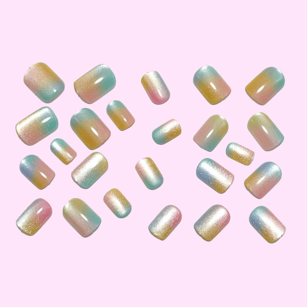 Artificial nails in delicate ombre design with glitter effects Bowlift