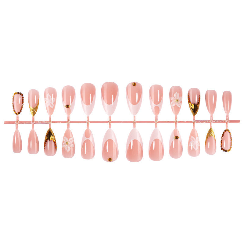 Artificial nail set with elegant flower and gold accents Bowlift
