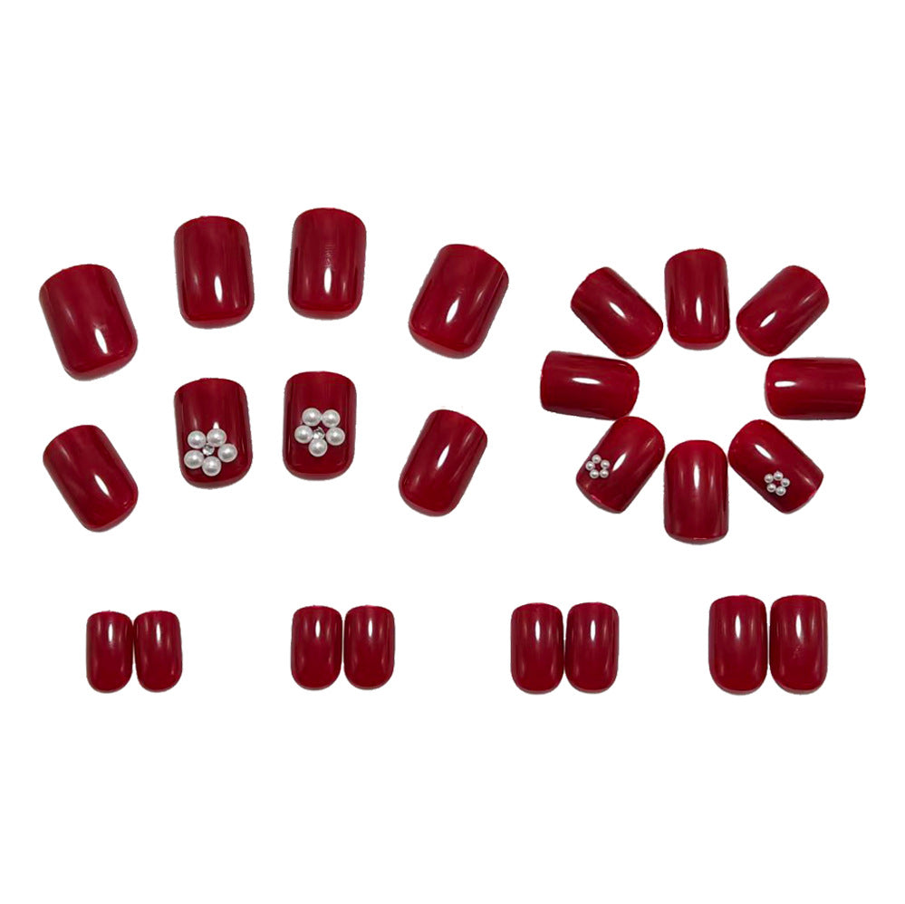 Artificial nails with glamorous decorations Bowlift