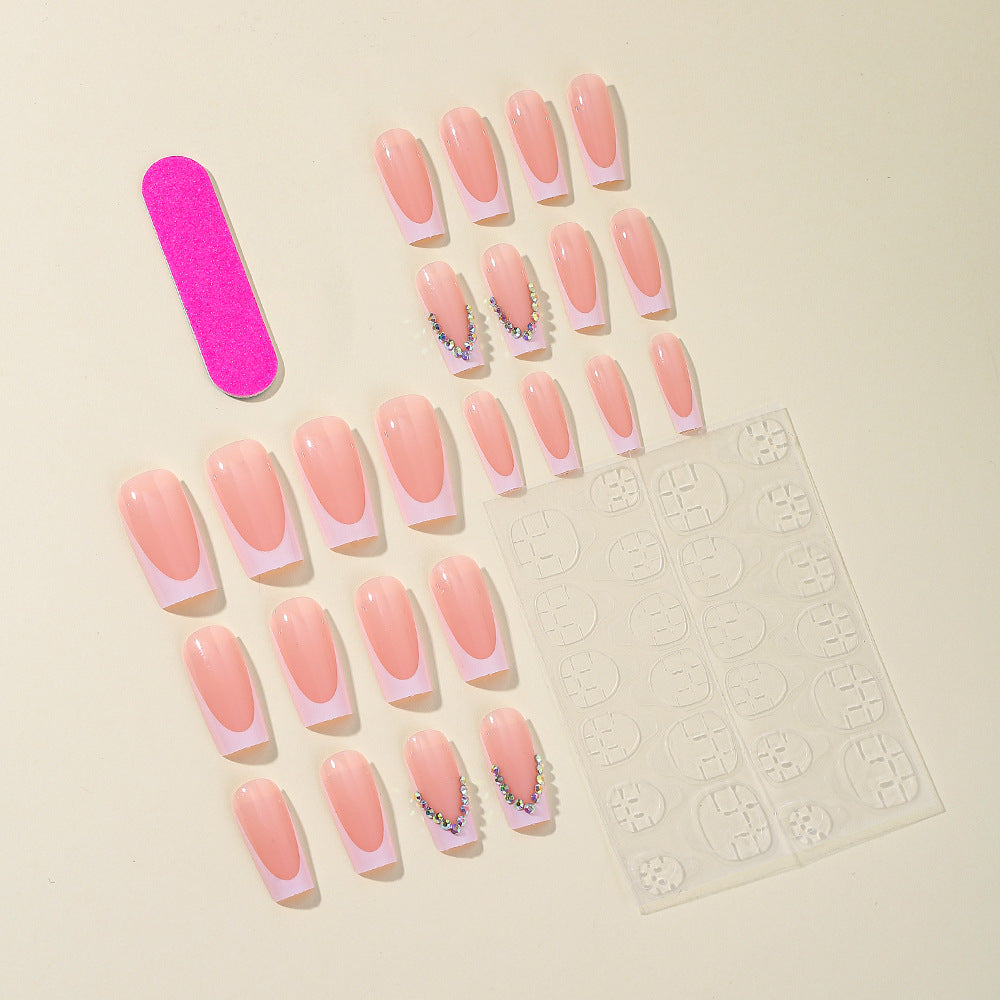 Elegant French Tip Acrylic Nail Extensions with Rhinestone Accents Bowlift