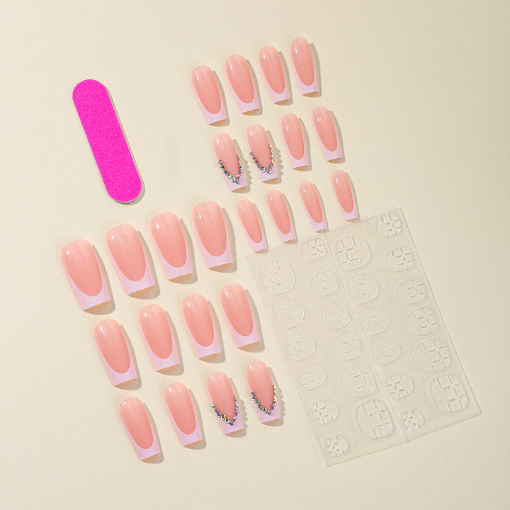 Elegant French Tip Acrylic Nail Extensions with Rhinestone Accents Bowlift