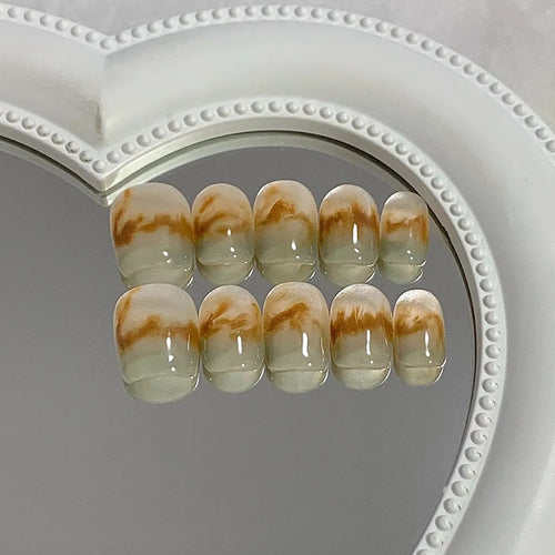 Artificial Nails in Elegant Marble Design Bowlift