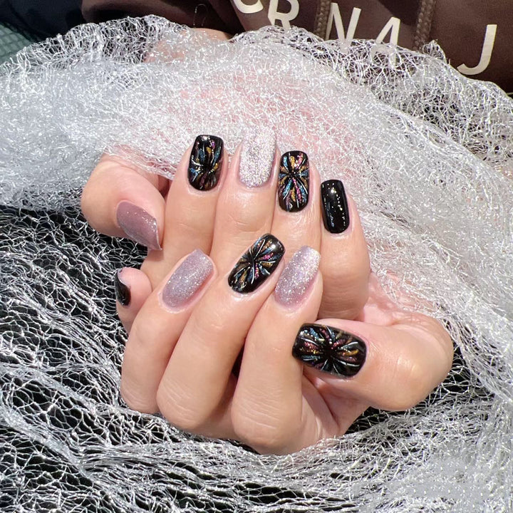 Artificial nails with glitter and floral patterns Bowlift