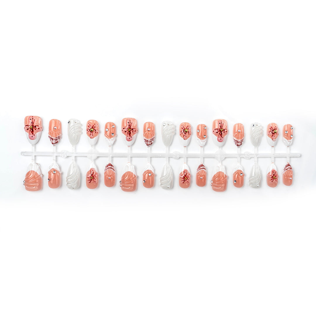 Artificial nails with handcrafted flower and glitter elements Bowlift