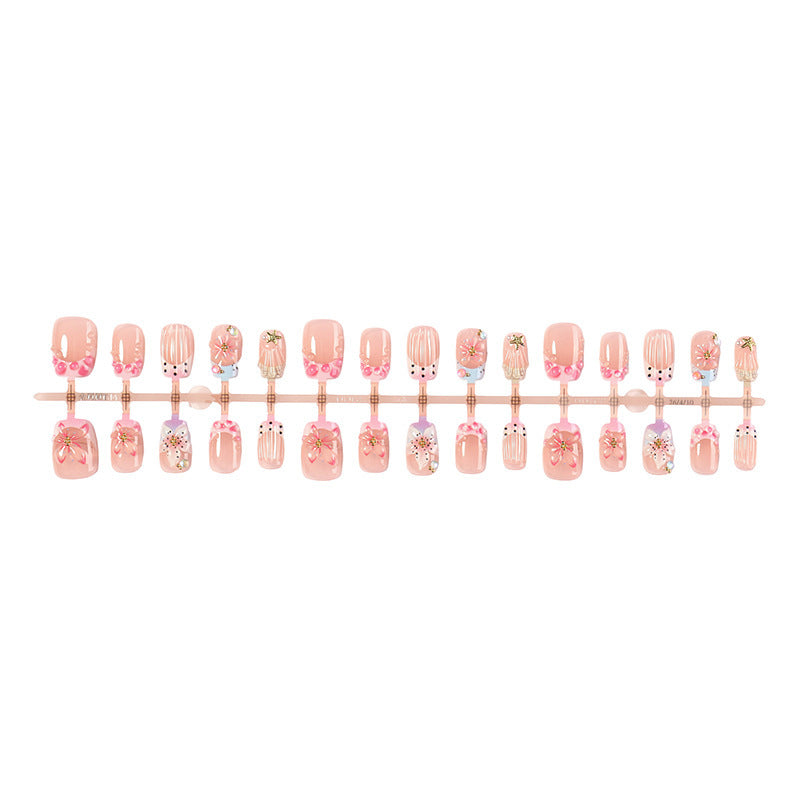 Artificial nail set with floral accents and glamorous decorations Bowlift