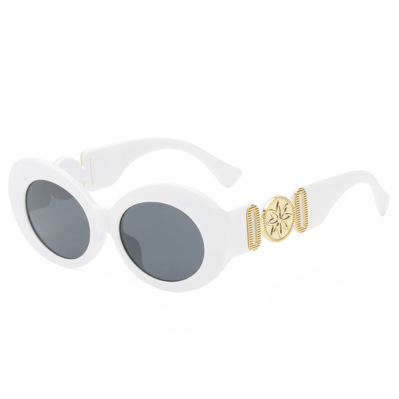 Ladies fashionable sunglasses with striking golden accents Bowlift