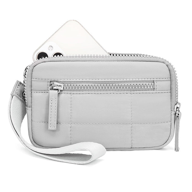 Stylish and Practical Cosmetic Clutch with Removable Carrying Strap Bowlift